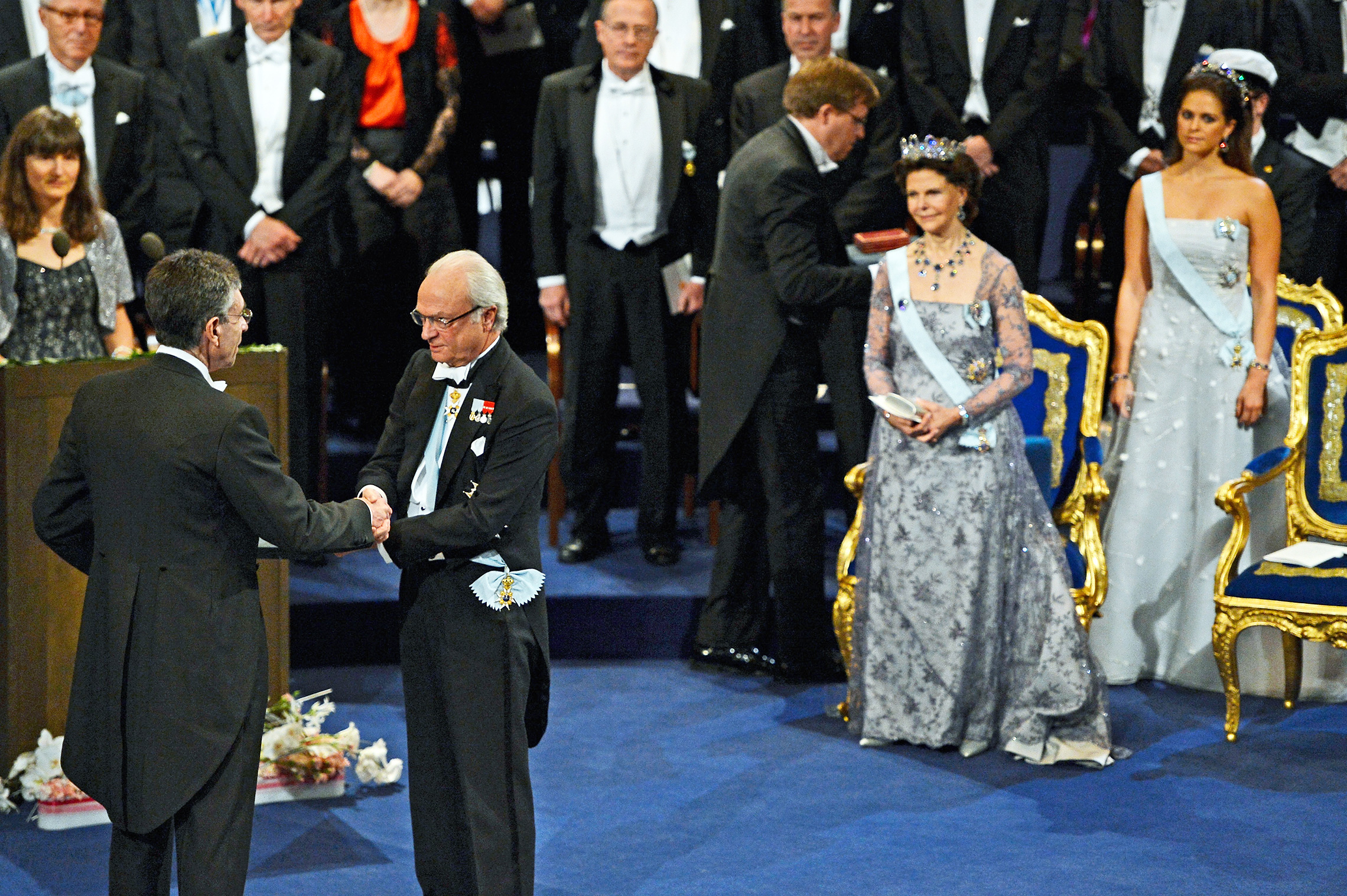 December 10, 2012: Dr. Robert Lefkowitz receives the 2012 Nobel Prize in Chemistry from Sweden's King Carl XVI Gustaf, as Queen Silvia and Princess Madeleine look on, at the Concert Hall in Stockholm. (Getty Images)