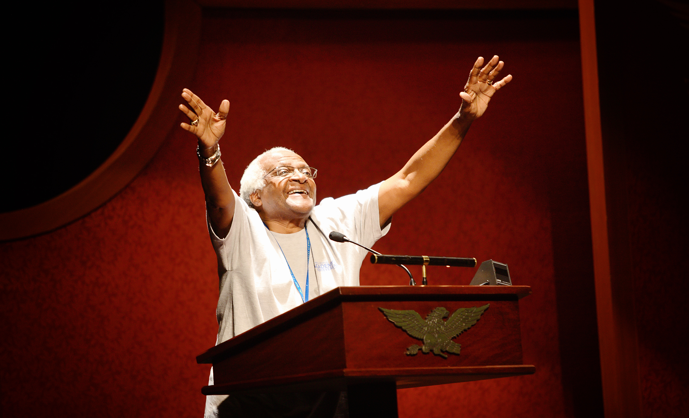 "Fly! Fly!" Archbishop Desmond Tutu exhorts the Academy delegates during an inspiring symposium presentation.