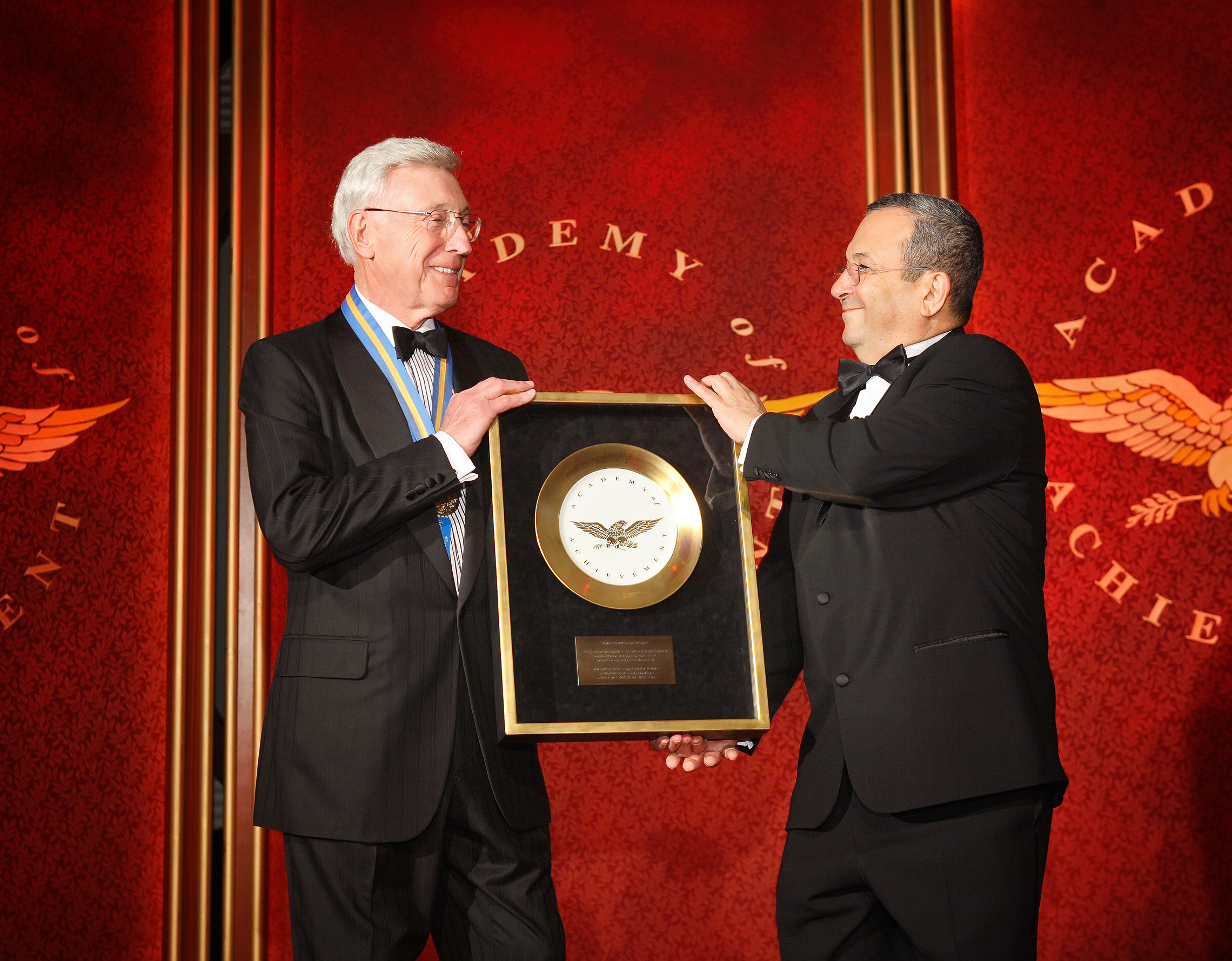 Home Depot co-founder Bernard Marcus receives the Golden Plate from former Israeli Prime Minister Ehud Barak.