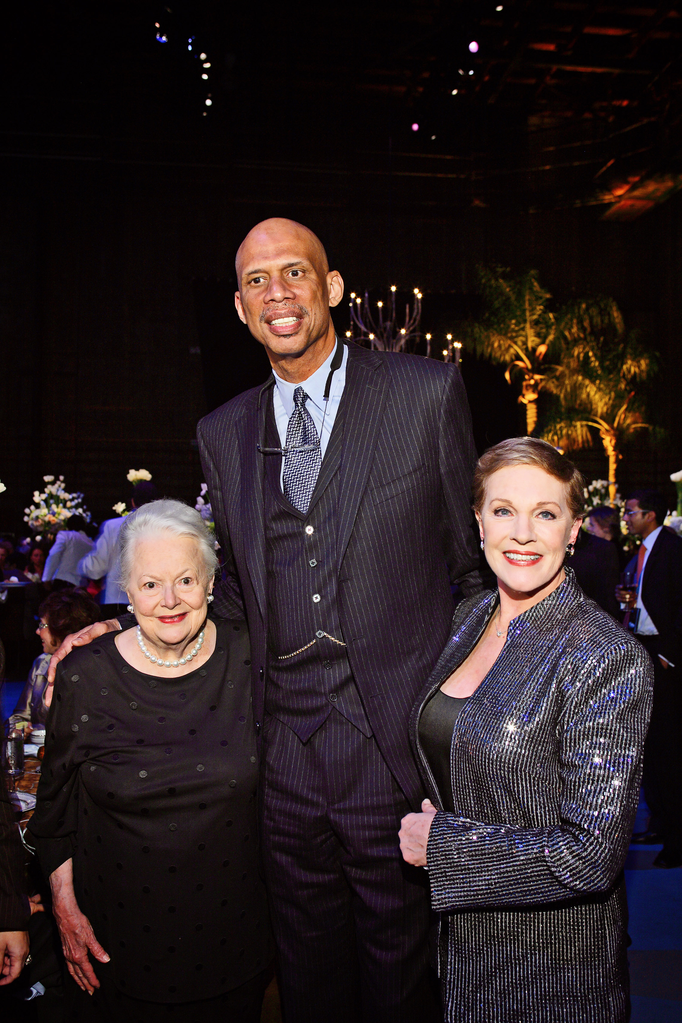 Hollywood legends Olivia de Havilland and Dame Julie Andrews with L.A. Lakers legend Kareem Abdul-Jabbar. 