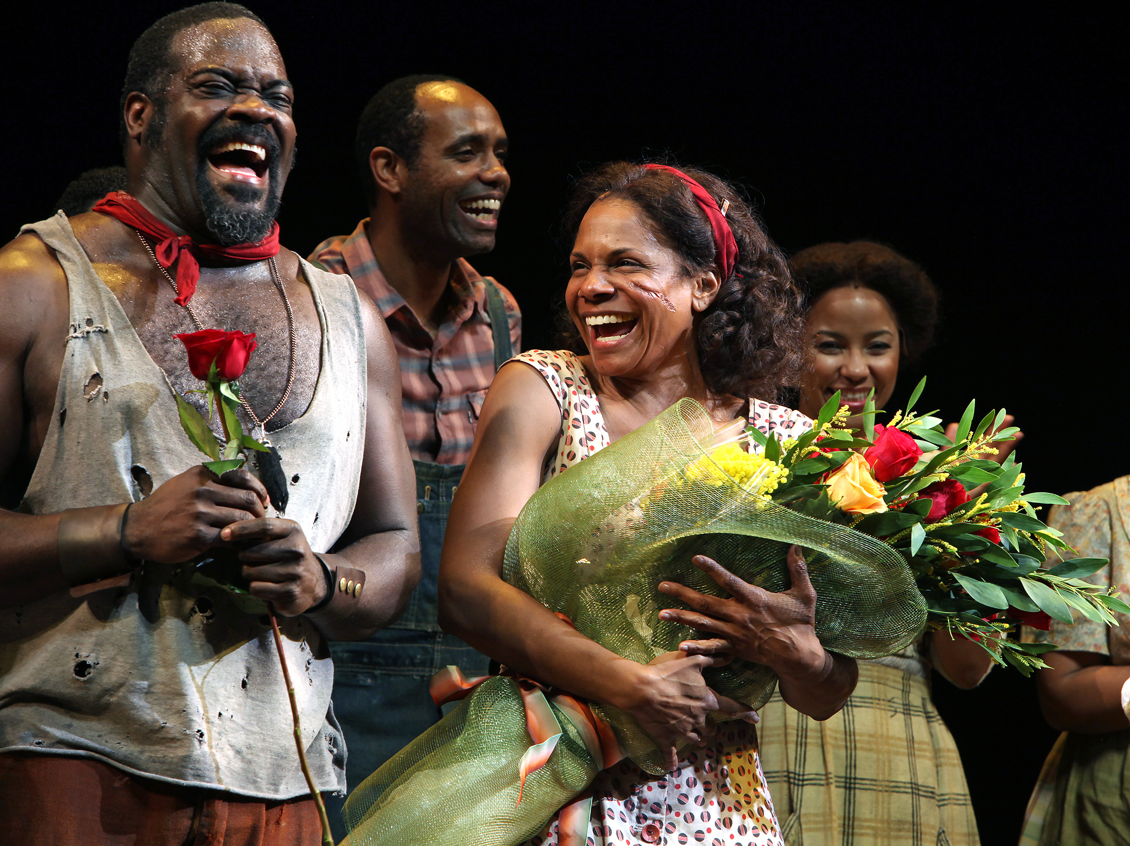 Phillip Boykin and Audra McDonald take a curtain call on the opening night of The Gershwins' <i>Porgy and Bess</i> at the Richard Rodgers Theatre in New York City, January 12, 2012. (© Walter McBride/Corbis)