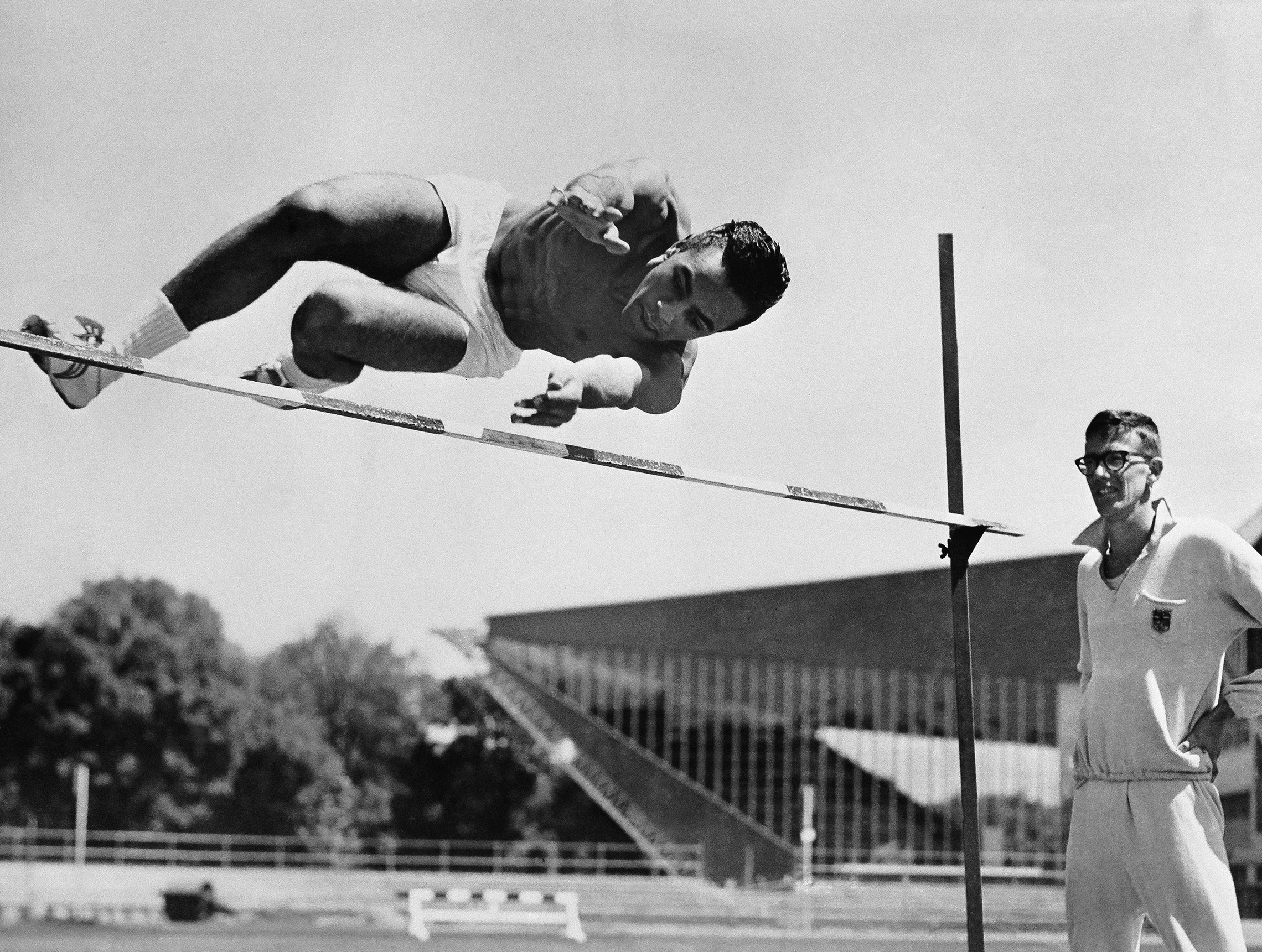 Johnny Mathis excelled at the high jump as a student at San Francisco State. He passed up the Olympic trials for his first major label recording session. (AP Images)