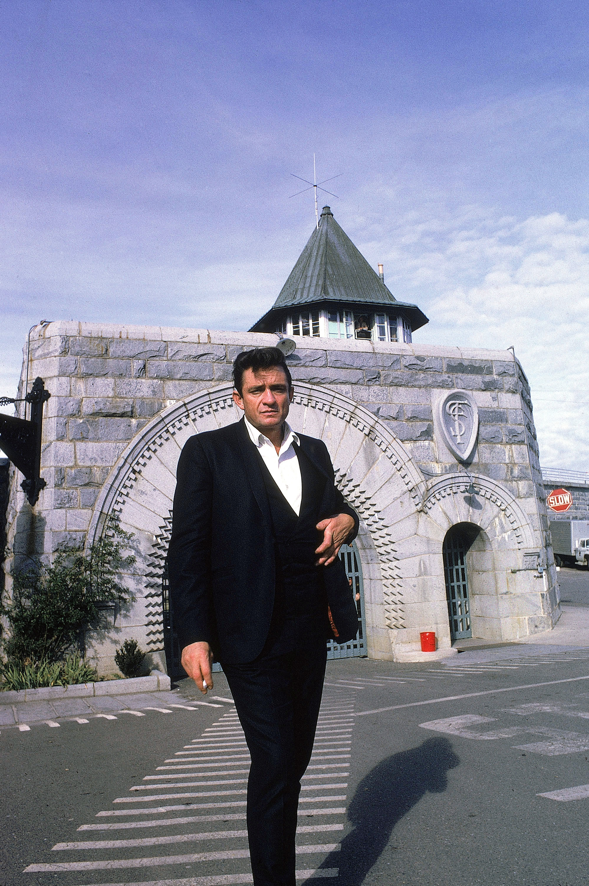 Country singer Johnny Cash poses outside the Folsom Prison in California on January 13, 1968, the day he recorded his live album Johnny Cash at Folsom Prison. (AP Photo/Dan Poush)
