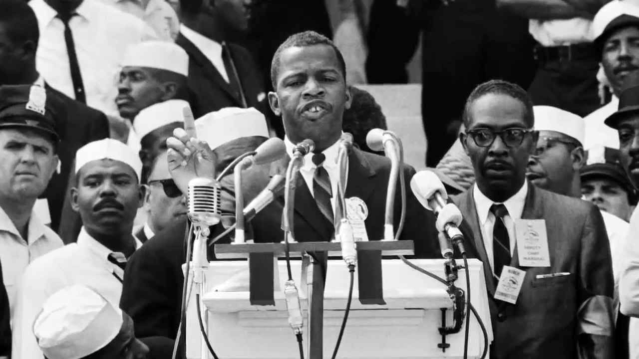 John Lewis, age 23, Chairman of the Student Nonviolent Coordinating Committee, speaks at the Lincoln Memorial during the historic March on Washington, August 28, 1963. (© Bettmann/CORBIS)