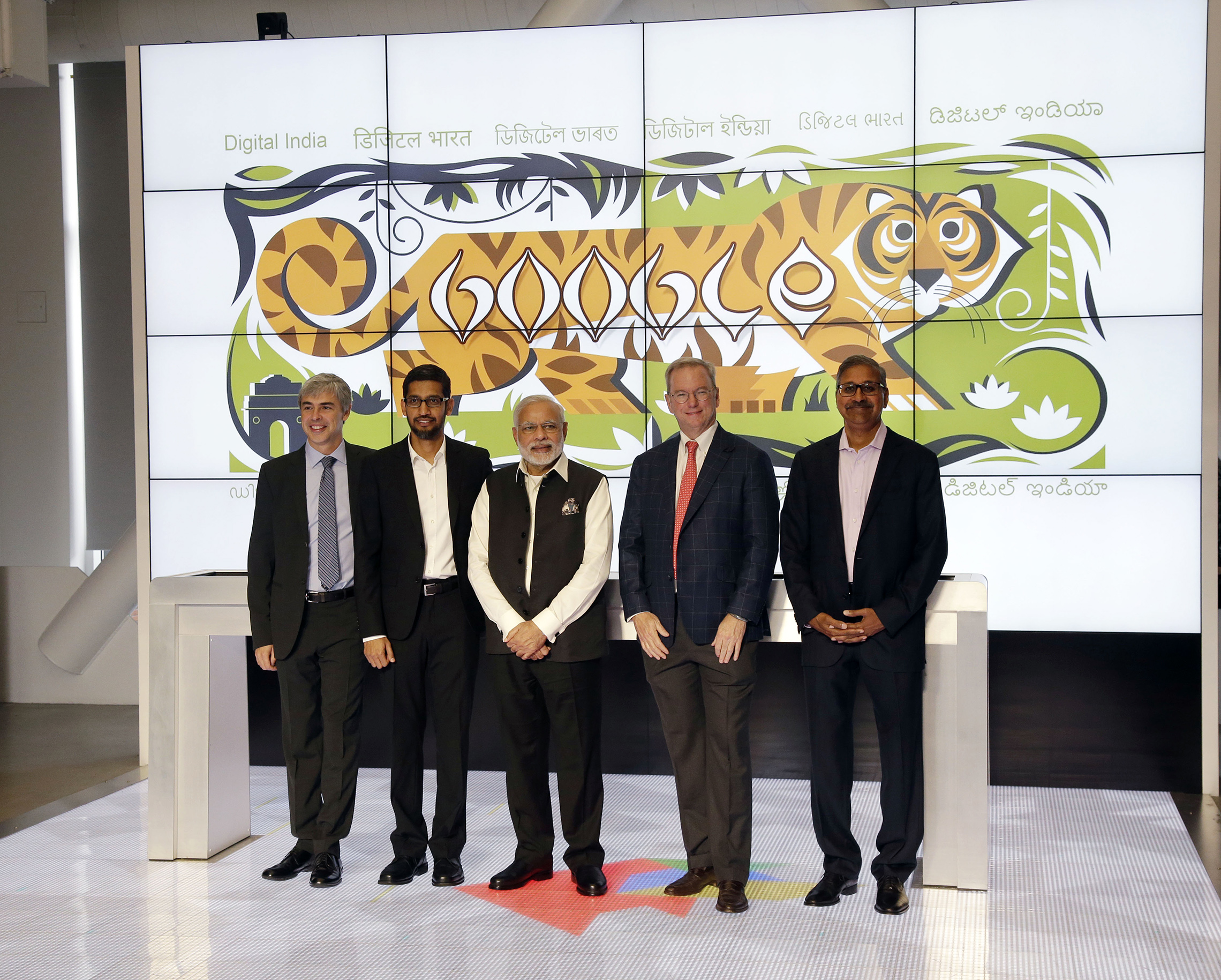 September 27, 2015: Prime Minister of India Narendra Modi, center, poses for a picture with Google executives including Larry Page, left, Sundar Pichar, second from left, Eric Schmidt, second from right, and investor Ram Sriram, far right, at the company's headquarters in Mountain View , Calif. (AP Photo/Marcio Jose Sanchez)