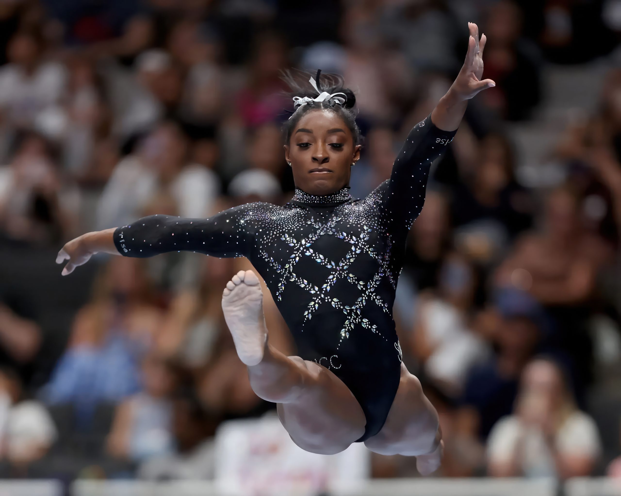Simone Biles ends the first day of competition at the US Gymnastics  Championships with the lead